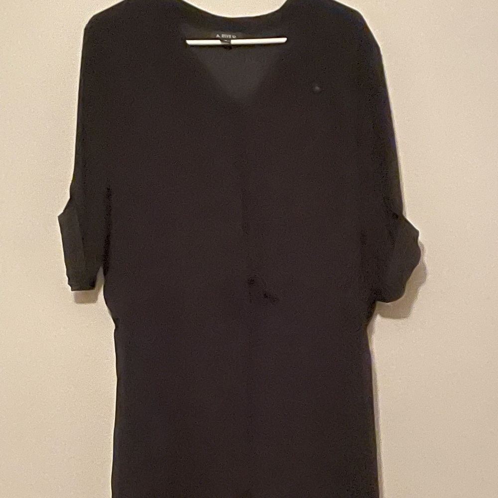 Cute black dress with tie at the waist. Excellent condition